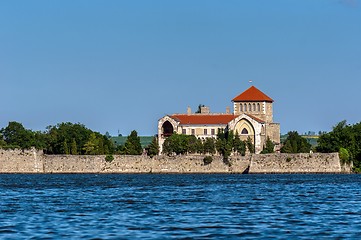 Image showing Small castle on the shores of a lake