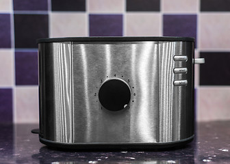 Image showing Toaster against purple background