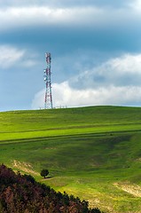 Image showing Transmission tower with green fields