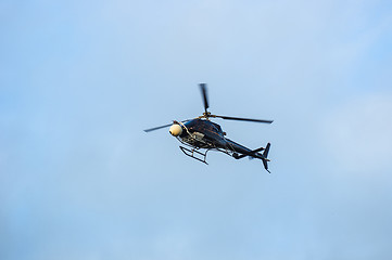Image showing Helicopter flying in the sky