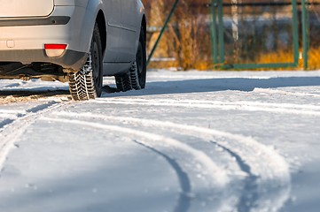 Image showing Tyre tracks on the road