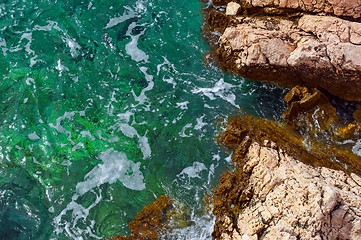 Image showing Shore of an ocean with big rocks