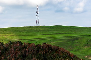 Image showing Transmission tower with green fields