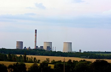 Image showing Nuclear power station at dusk with cooling towers