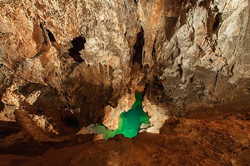 Image showing Underground lake sorrunded by rocks