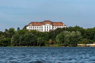 Image showing Small castle on the shores of a lake
