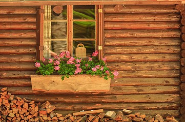 Image showing Small wooden cottage with window