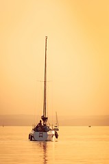 Image showing Sailing boats with a beautiful sunset