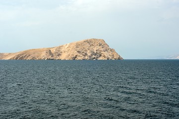 Image showing Shore of an ocean with big rocks