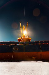 Image showing Industrial crane at the dock