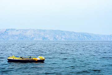 Image showing Small rubber boat on the sea