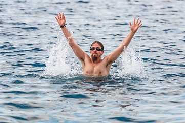 Image showing Muscular swimmer in the water