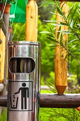 Image showing Steel garbage bin outdoors