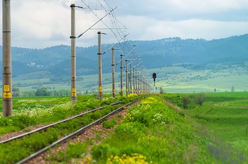 Image showing Rural railroad with blue sky