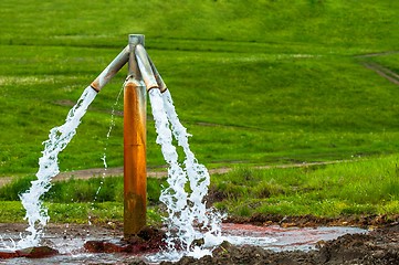 Image showing Water flowing from outdoor tap