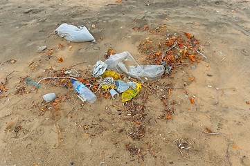 Image showing Rubbish on the shores of an ocean