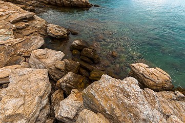 Image showing Shore of an ocean with big rocks