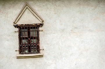 Image showing Rusty old window on white wall