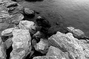 Image showing Shore of an ocean with big rocks