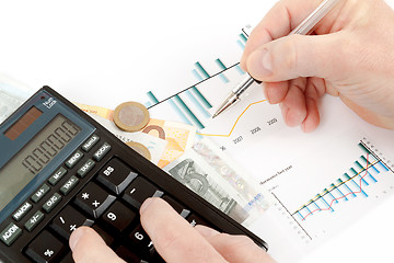 Image showing calculator, charts, pen in hand, business cards, money, workplace businessman, business 