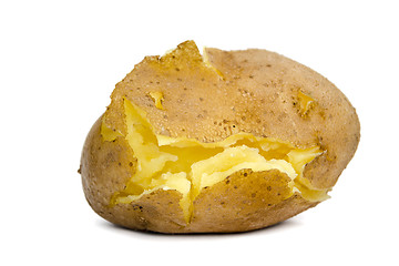 Image showing Unpeeled cracked cooked potato on a white background