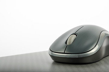 Image showing Wireless computer mouse on a metallic background