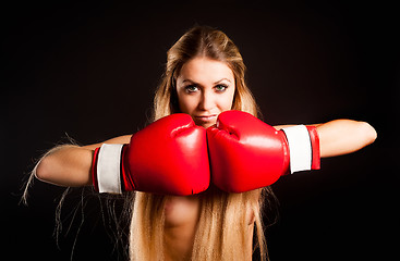 Image showing beautiful nude girl with boxing gloves