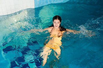 Image showing Attractive girl in swimming pool