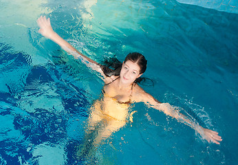 Image showing Attractive girl in swimming pool