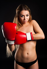 Image showing beautiful nude girl with boxing gloves