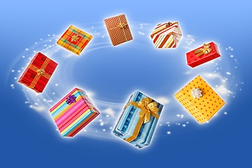 Image showing Wrapped presents rotating and flying around