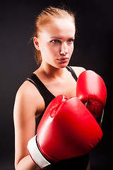 Image showing Pretty girl with boxing gloves