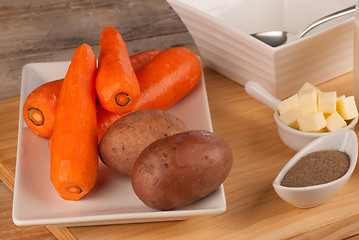 Image showing Carrot soup still life