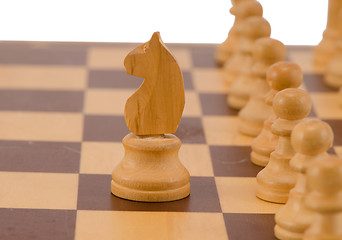 Image showing wooden chess figure knight stand pawn line board 