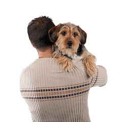 Image showing Man Holding a Borkie Dog