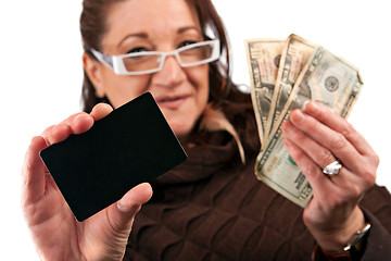 Image showing Woman Holding Cash and Credit Card