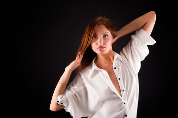 Image showing young sexy woman in white shirt