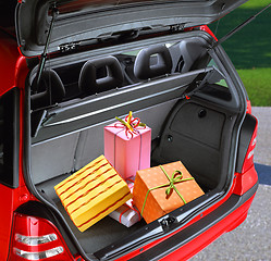 Image showing present boxes in a car