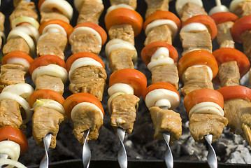 Image showing shashlik and tomatos