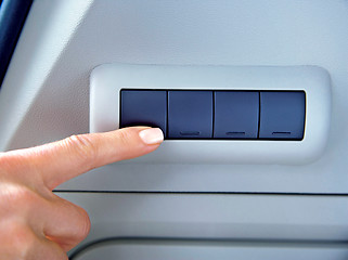 Image showing finger on buttons