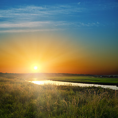 Image showing golden sunset over river