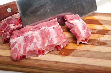 Image showing chopping fresh pork ribs 