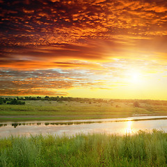 Image showing golden sunset over river