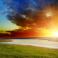 Image showing dramatic sunset over river