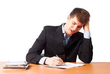 Image showing Cute man writing document