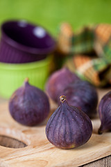 Image showing  fresh figs, bowls and towel