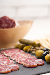 Image showing cold cut platter with pita bread and pickles