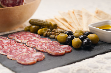 Image showing cold cut platter with pita bread and pickles