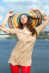 Image showing Brunette wearing colorful hat