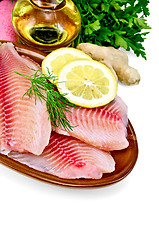 Image showing Fillets tilapia with oil and ginger